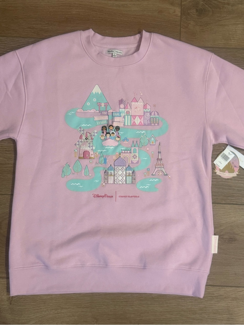 Disney Parks Stoney Clover It’s A Small World Pastel Pink Sweatshirt -NWT!